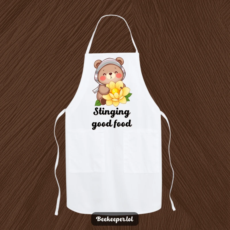 Funny Apron: A cheerful bear wearing a striped veil and holding a dipper, gently gathering nectar from a flower, adding a humorous and protective layer for kitchen tasks.