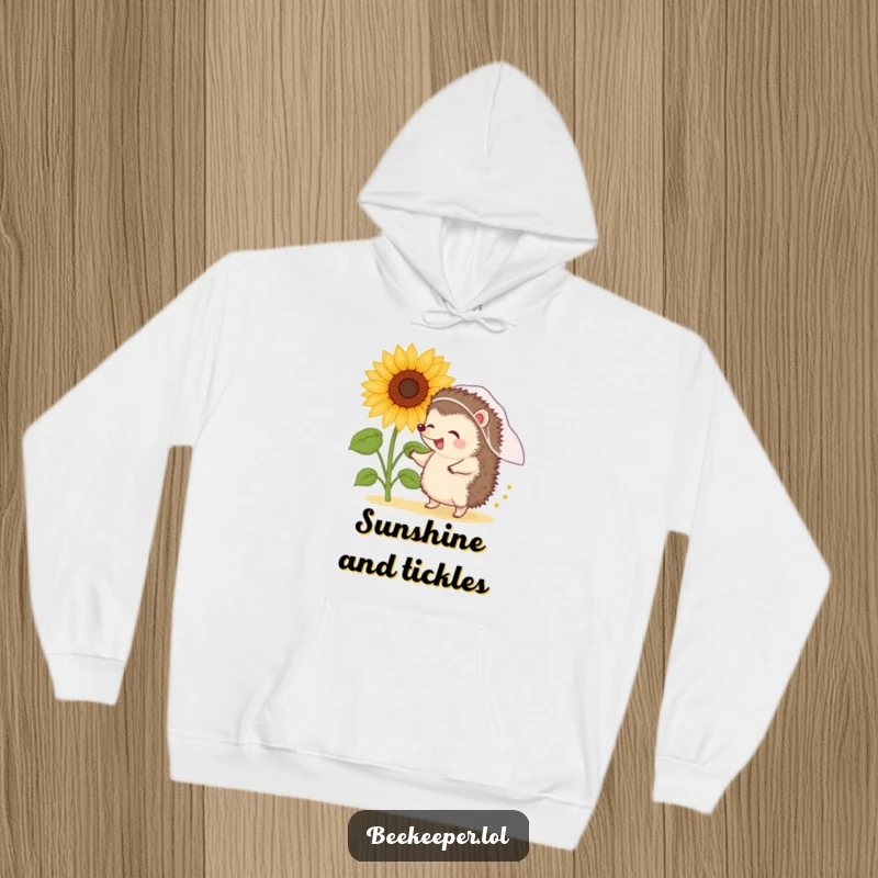 Funny hedgehog wearing a veil dances exuberantly near a sunflower filled with pollen, on a warm hoodie.